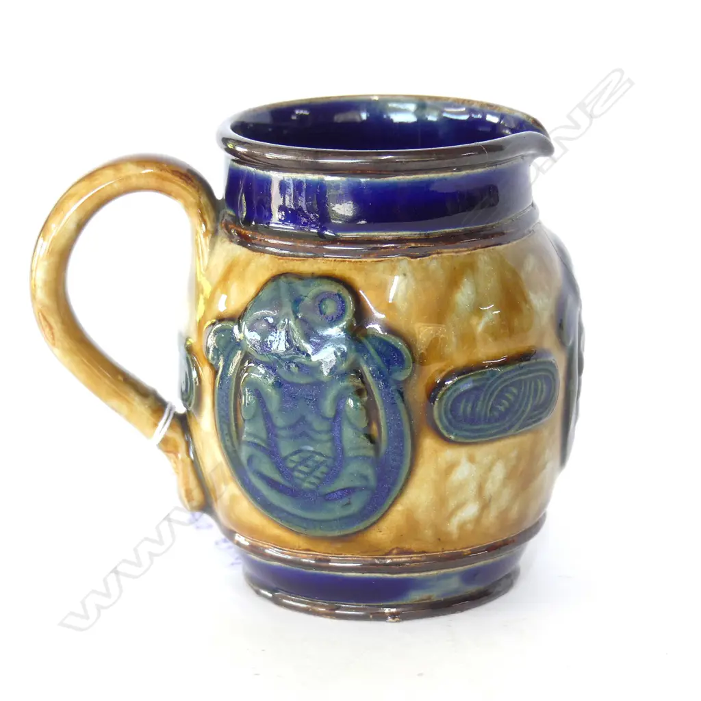 SMALL DOULTON MAORI ART JUG WITH 3 TIKI PANELS H.80mm (hairline cracks to rim, chip to base)) Image 1++