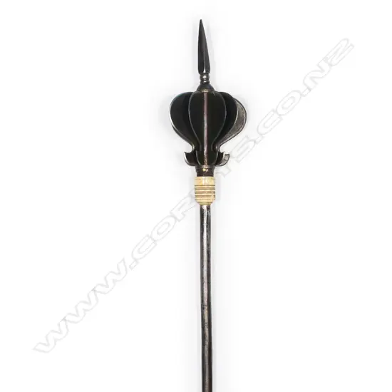 An Indian steel mace with eight ogee shaped flanged head above a bone collar,