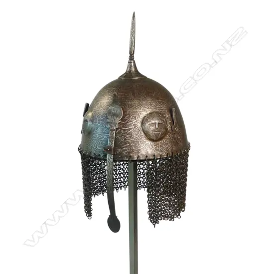 A good 19thC Persian Qajar iron helmet with square spike finial, nasal bar and plume holders,