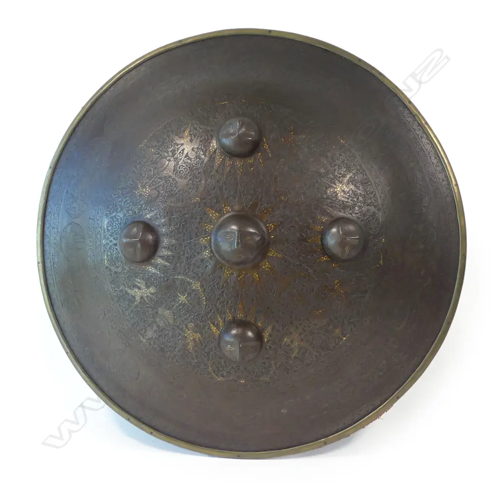 A  good 19thC Persian Qajar circular convex steel shield (sipar), with raised sun mask bosses to the centre, gold damascened and engraved, Image 1++