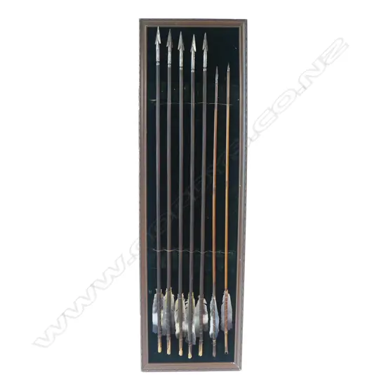 A display board of five 19thC Indo-Persian and two 16thC style Ottoman Turk arrows