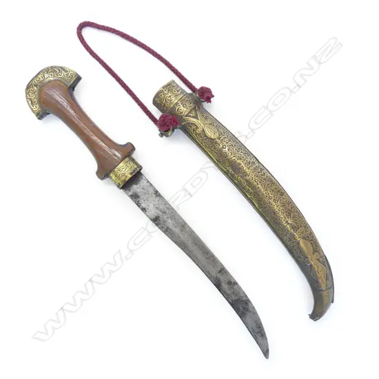 A Turkish kinjal dagger, with brass embossed scabbard.