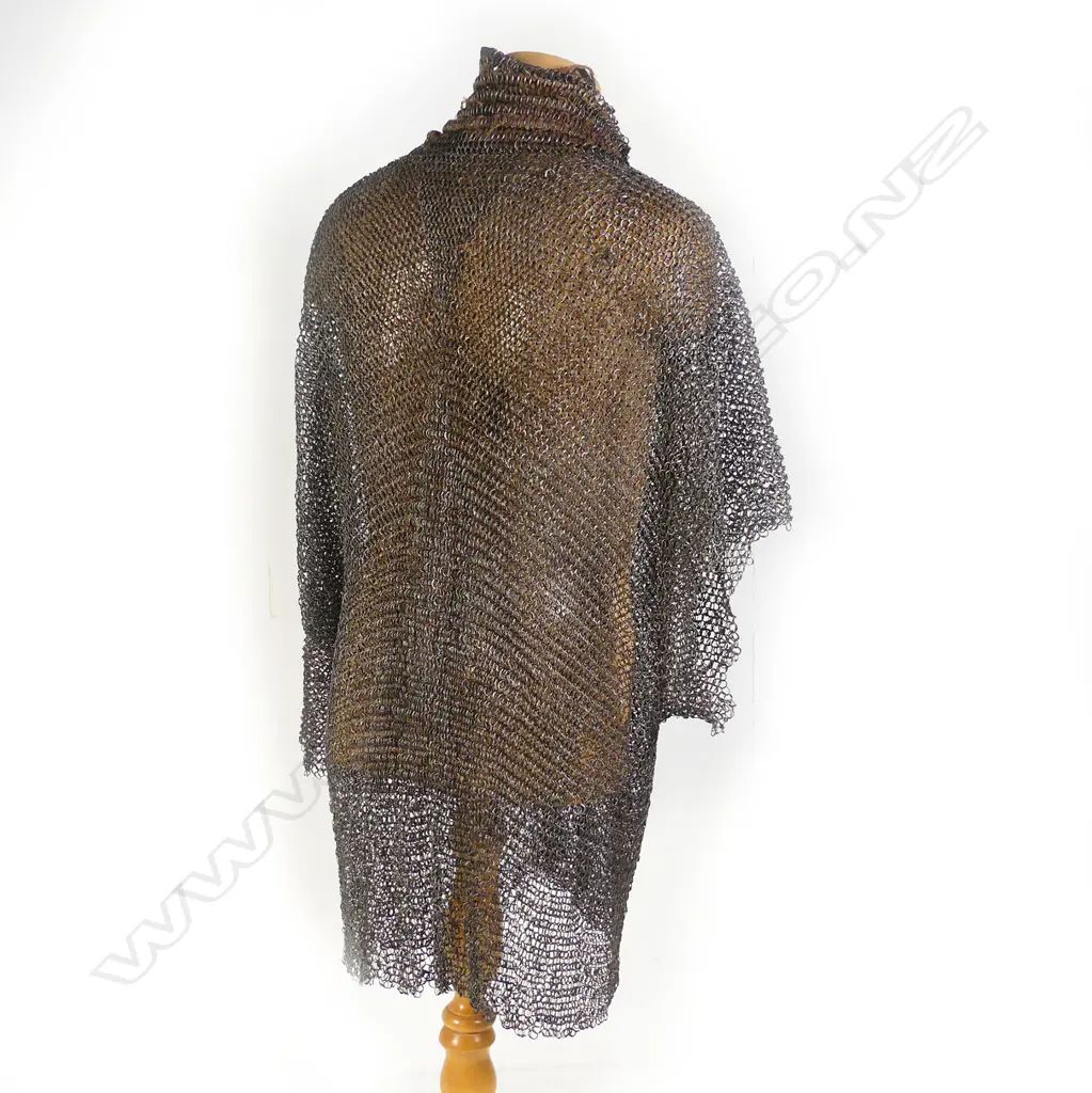 A mail shirt, probably Ottoman Turkish 17/18thC of large proportions, formed of riveted rings of circular and oval section wire, Image 1++