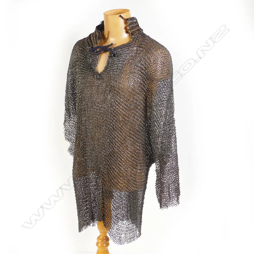 A mail shirt, probably Ottoman Turkish 17/18thC of large proportions, formed of riveted rings of circular and oval section wire, Image 1++
