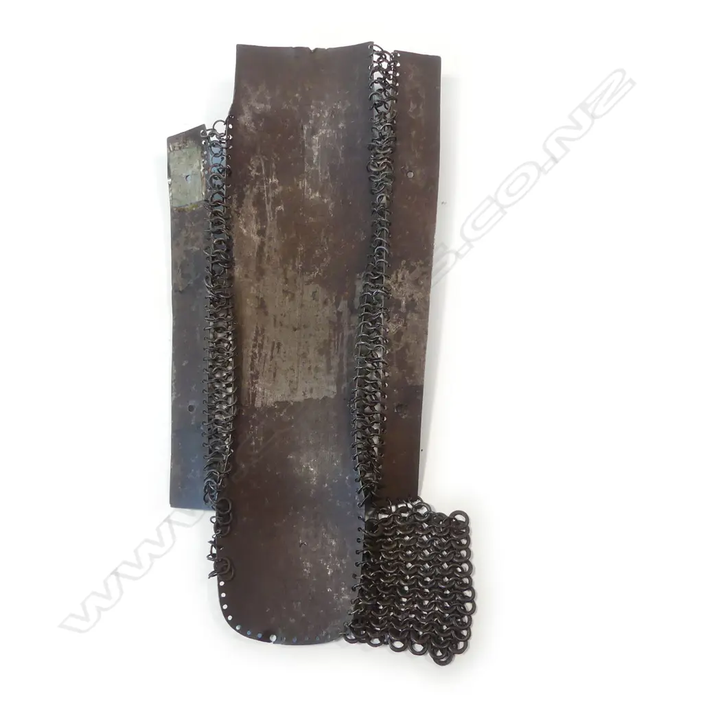 A 15th/17thC Ottoman / Persian Safavid defence for the left leg (greave), of three plates of steel connected by links of solid and riveted chainmail Image 1++