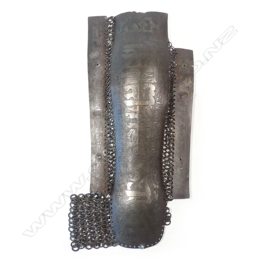 A 15th/17thC Ottoman / Persian Safavid defence for the left leg (greave), of three plates of steel connected by links of solid and riveted chainmail Image 1++