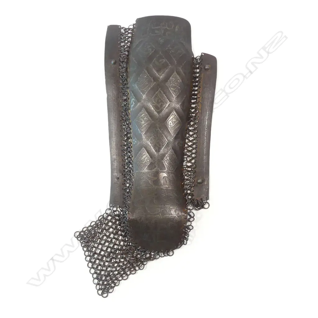 A 15th/17thC Ottoman / Persian Safavid defense for the left leg (greave), for protection of the lower leg of equestrian warriors, of three plates of steel connected by links of solid and riveted chainmail, Image 1++