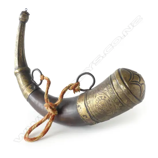 An antique horn powder flask, with brass mounts,