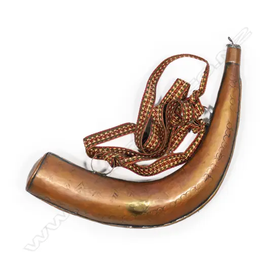 A copper powder flask, with simple decoration,