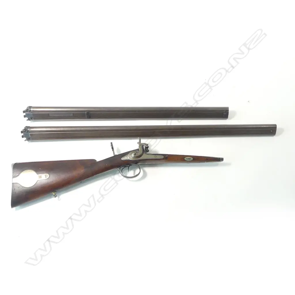 A fine muzzle loading percussion double barrel rifle/shotgun, cased, with two sets of barrels, by Franz Leutheuser, Graz, Austria, c.1860. Image 1++