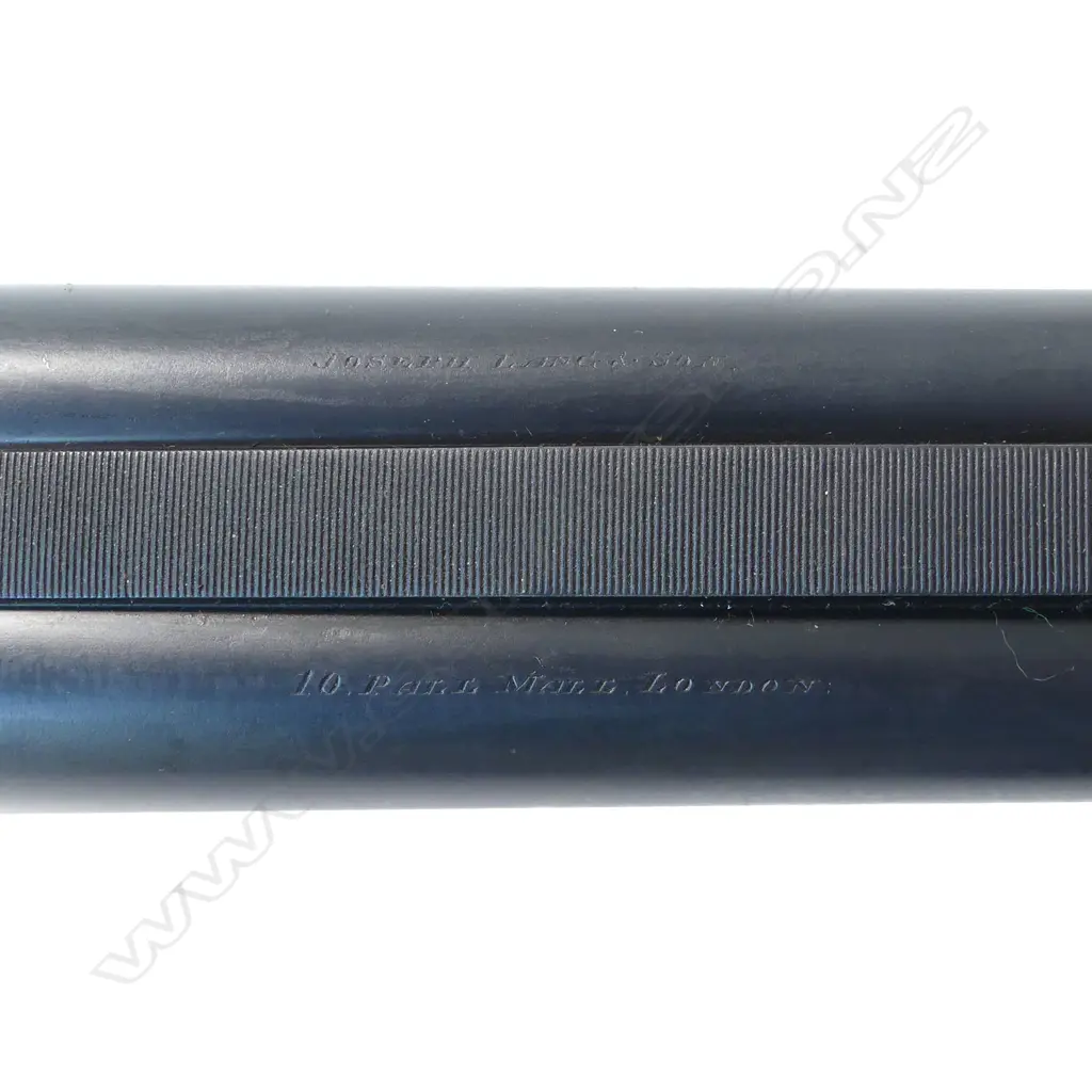 A 19thC under lever double barrel .450 express rifle by Joseph Lang & Son, London, circa 1891. In associated leather case Image 1++