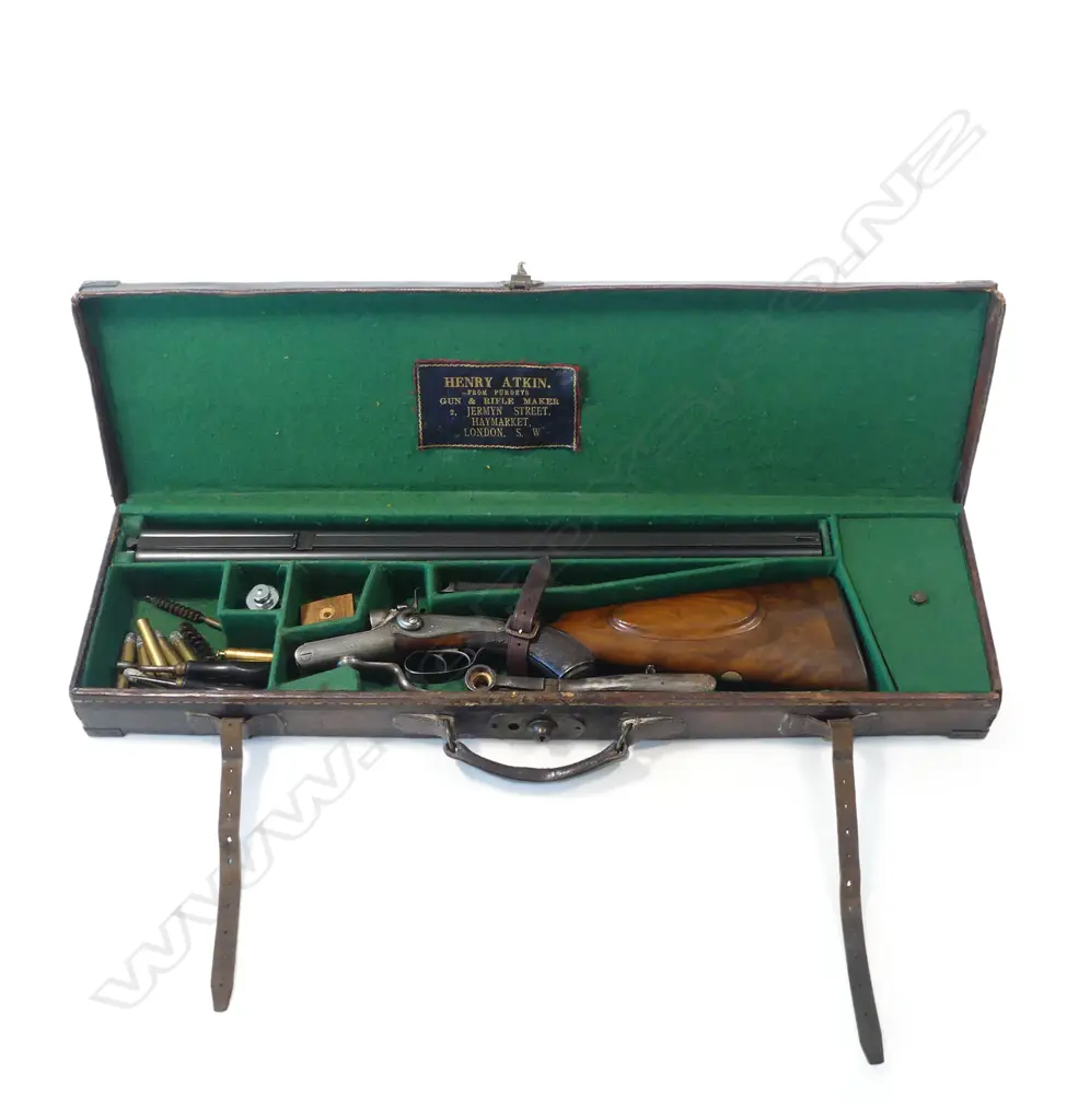 A 19thC under lever double barrel .450 express rifle by Joseph Lang & Son, London, circa 1891. In associated leather case Image 1++
