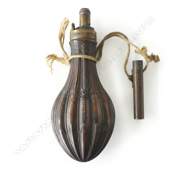 A 19thC copper and brass gunpowder flask, teardrop shape,