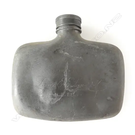 A WWI serviceman’s pewter hip flask, with engraved details to one side:
