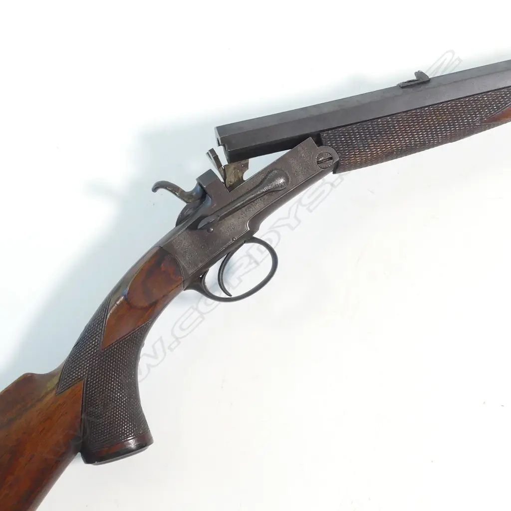 A .300 cal rook rifle, by T. Newton, Manchester, with additional .410 shotgun barrel. Image 1++