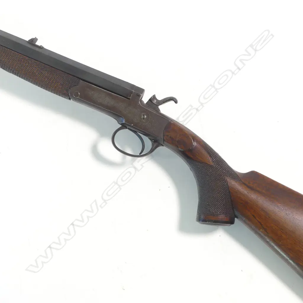 A .300 cal rook rifle, by T. Newton, Manchester, with additional .410 shotgun barrel. Image 1++