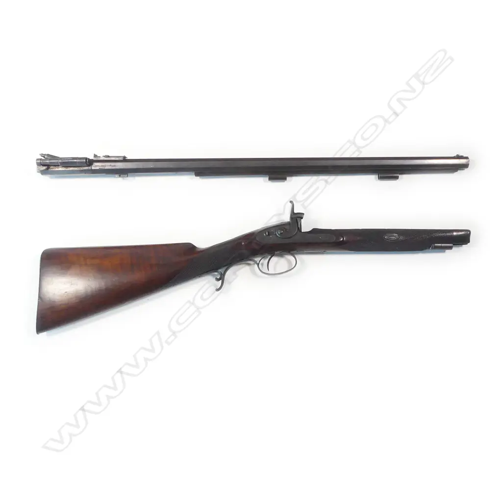 A Snider action .450 cal sporting rifle, with walnut stock, in brass bound oak fitted case Image 1++