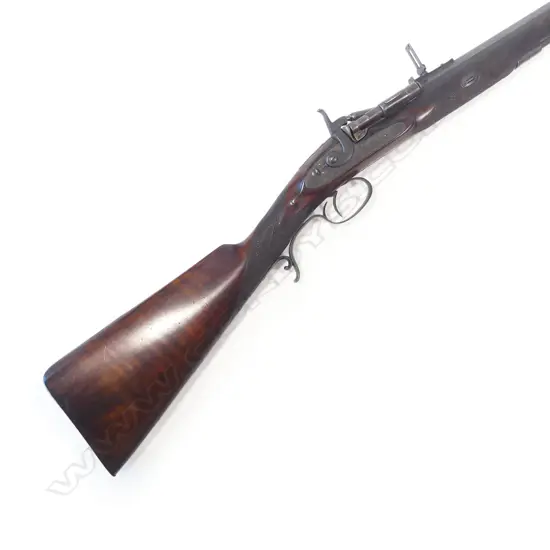 A Snider action .450 cal sporting rifle, with walnut stock, in brass bound oak fitted case