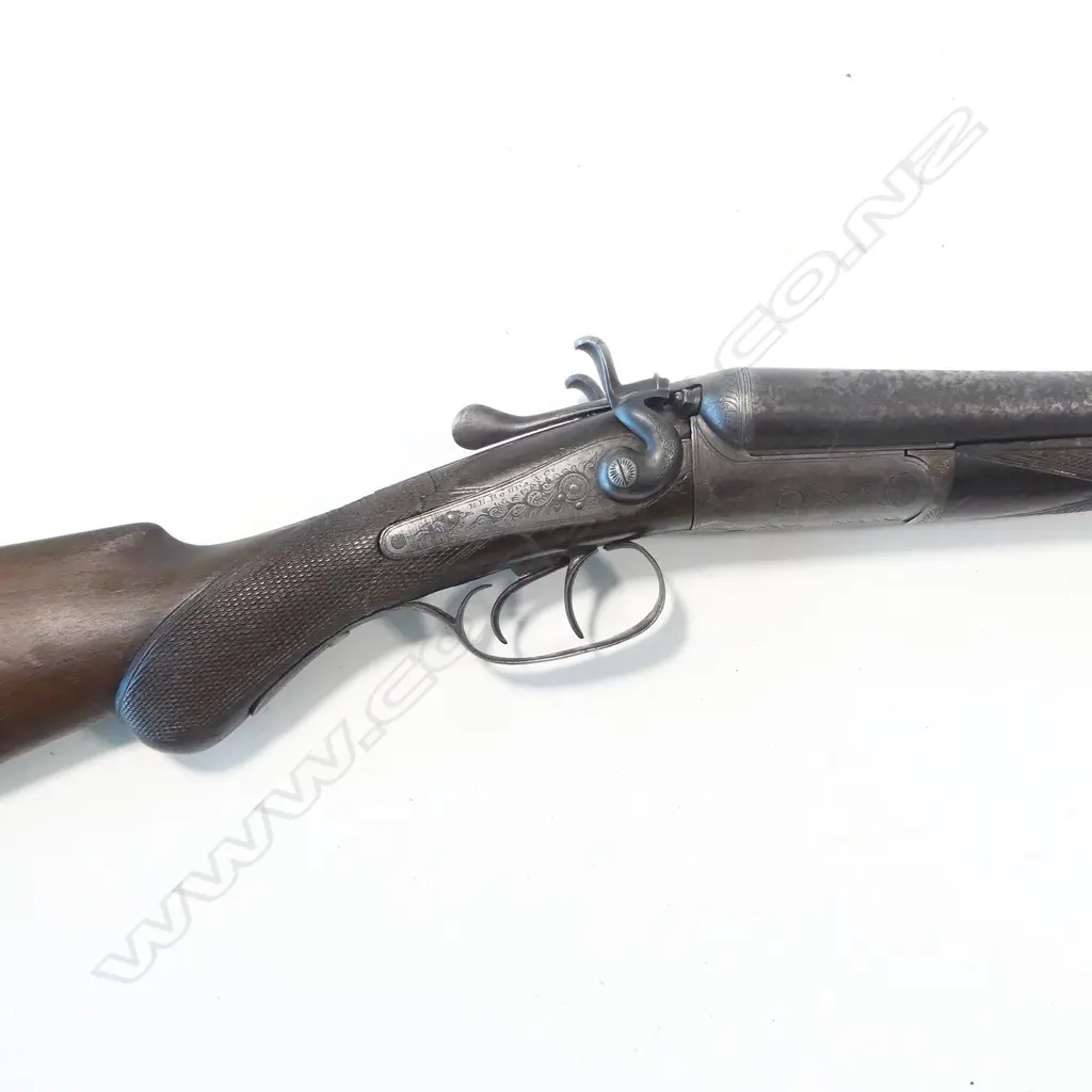 A 20 bore double barrel shotgun by R.B Rodda & Co., in green canvas case. Image 1++