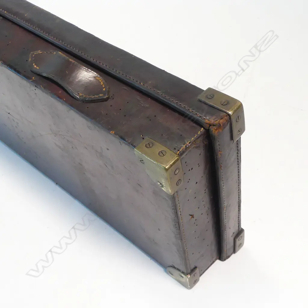 A 12 bore, hammerless double barrel shotgun by Enos James & Co. With leather case, Image 1++