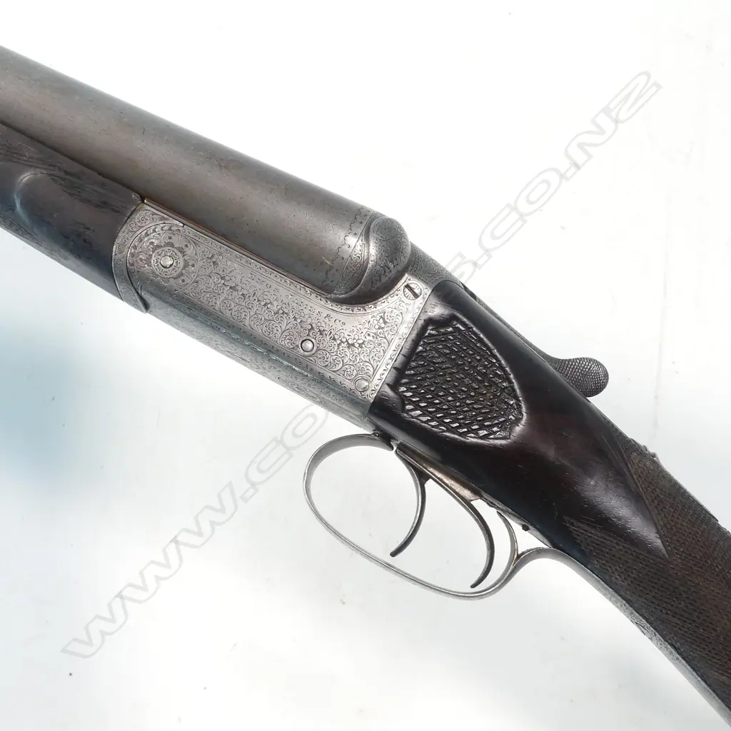 A 12 bore, hammerless double barrel shotgun by Enos James & Co. With leather case, Image 1++