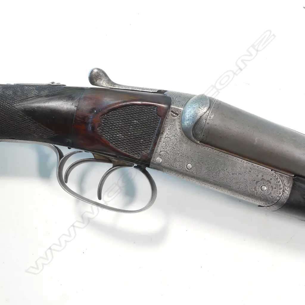 A 12 bore, hammerless double barrel shotgun by Enos James & Co. With leather case, Image 1++