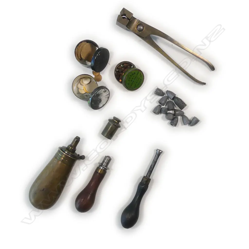 A  mid-19thC .50 cal smoothbore muzzle loading percussion rifle with spare 20 bore shotgun barrel, by Clayton of Lymington. In baize lined fitted oak case with accessories. Image 1++