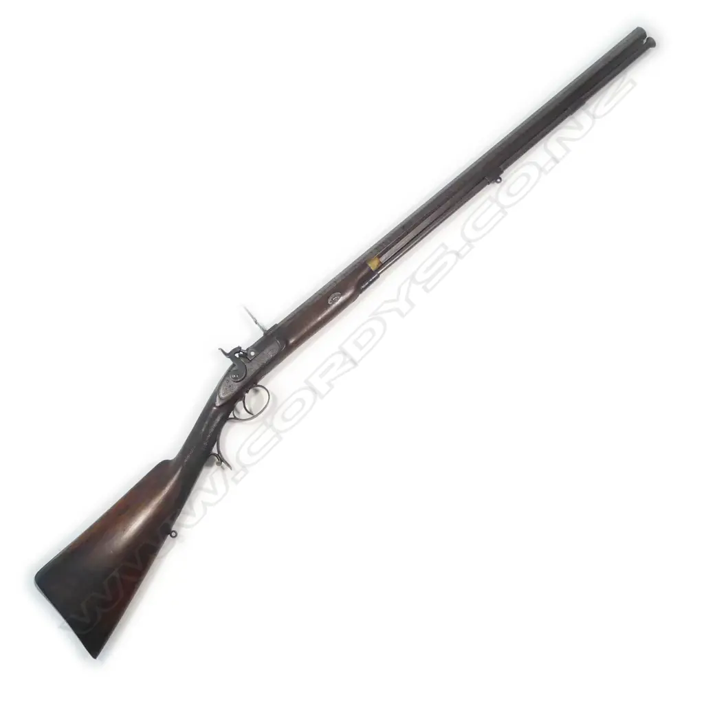 A  mid-19thC .50 cal smoothbore muzzle loading percussion rifle with spare 20 bore shotgun barrel, by Clayton of Lymington. In baize lined fitted oak case with accessories. Image 1++