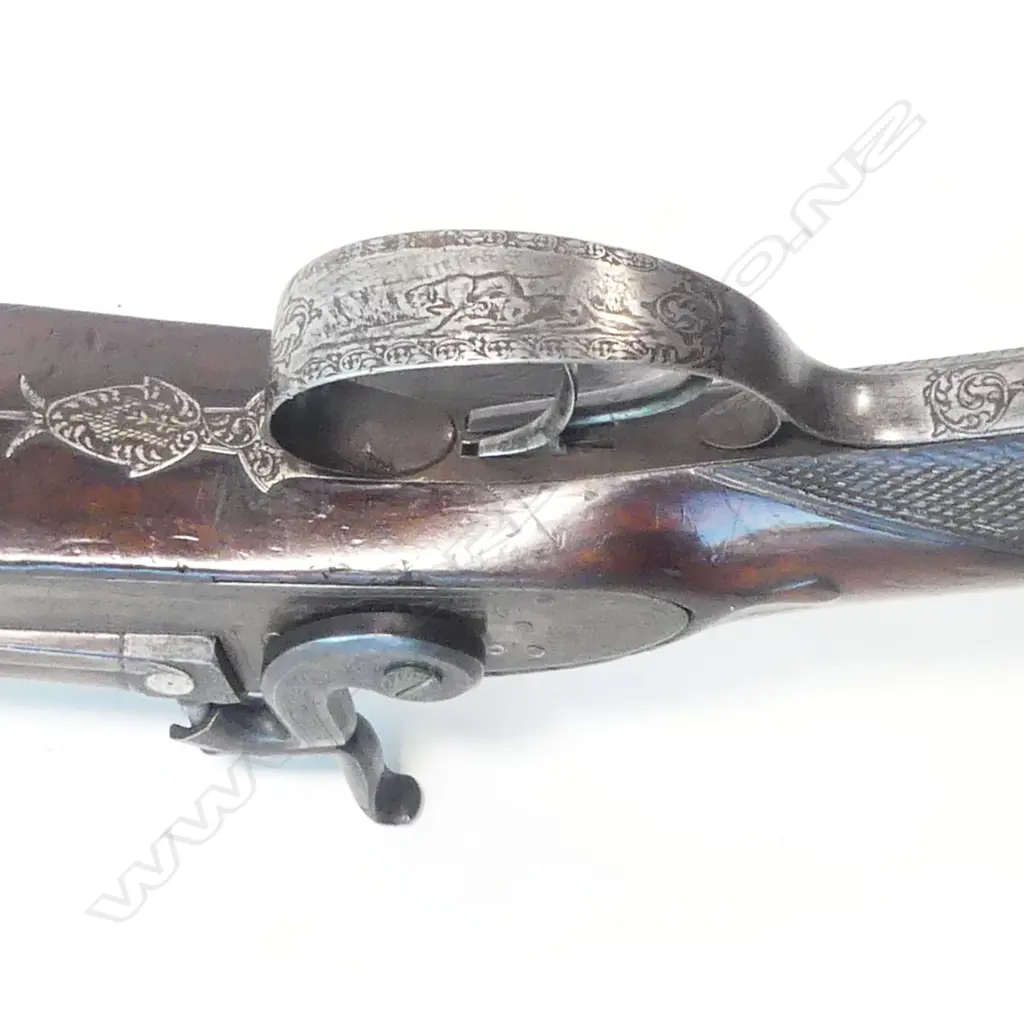 A fine early19thC .18 bore muzzle loading percussion double barrel sporting gun, by John Manton & Son, London, in baize lined fitted mahogany case. Image 1++