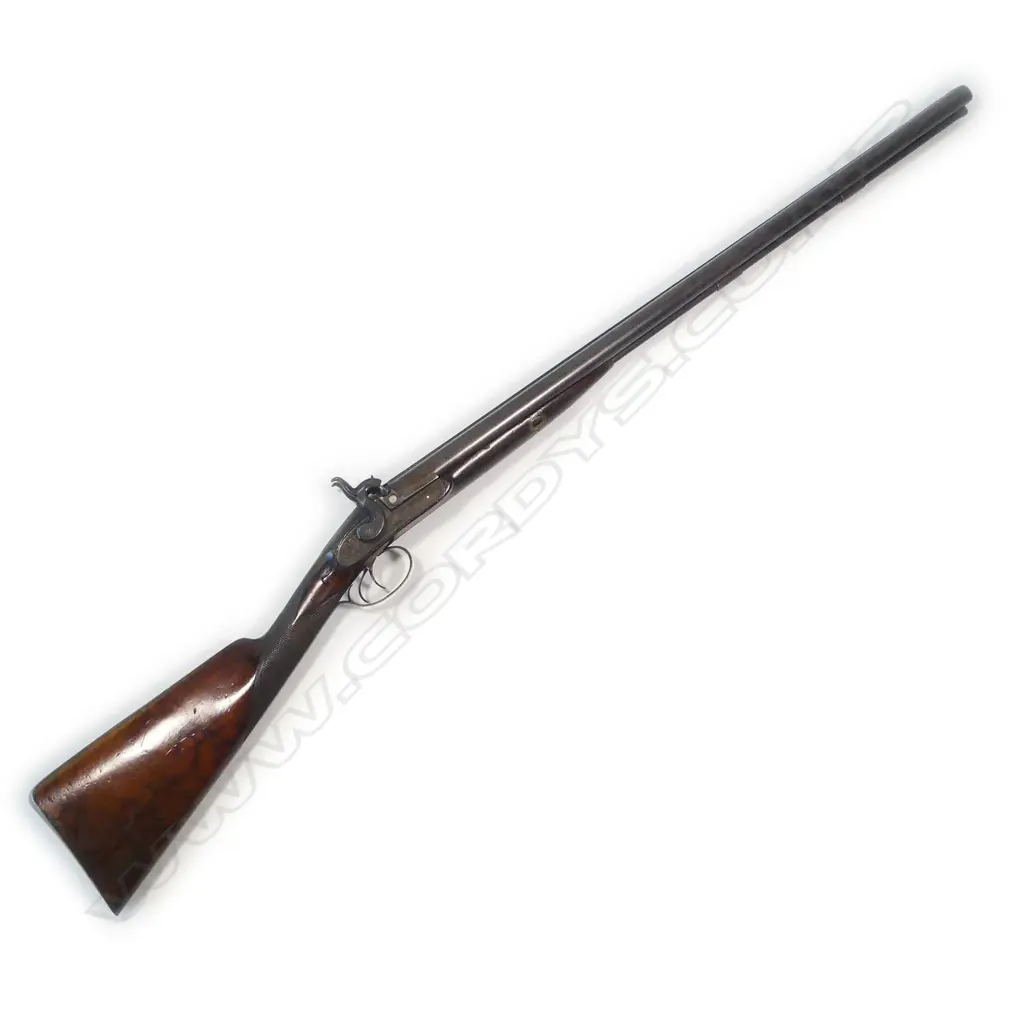 A fine early19thC .18 bore muzzle loading percussion double barrel sporting gun, by John Manton & Son, London, in baize lined fitted mahogany case. Image 1++