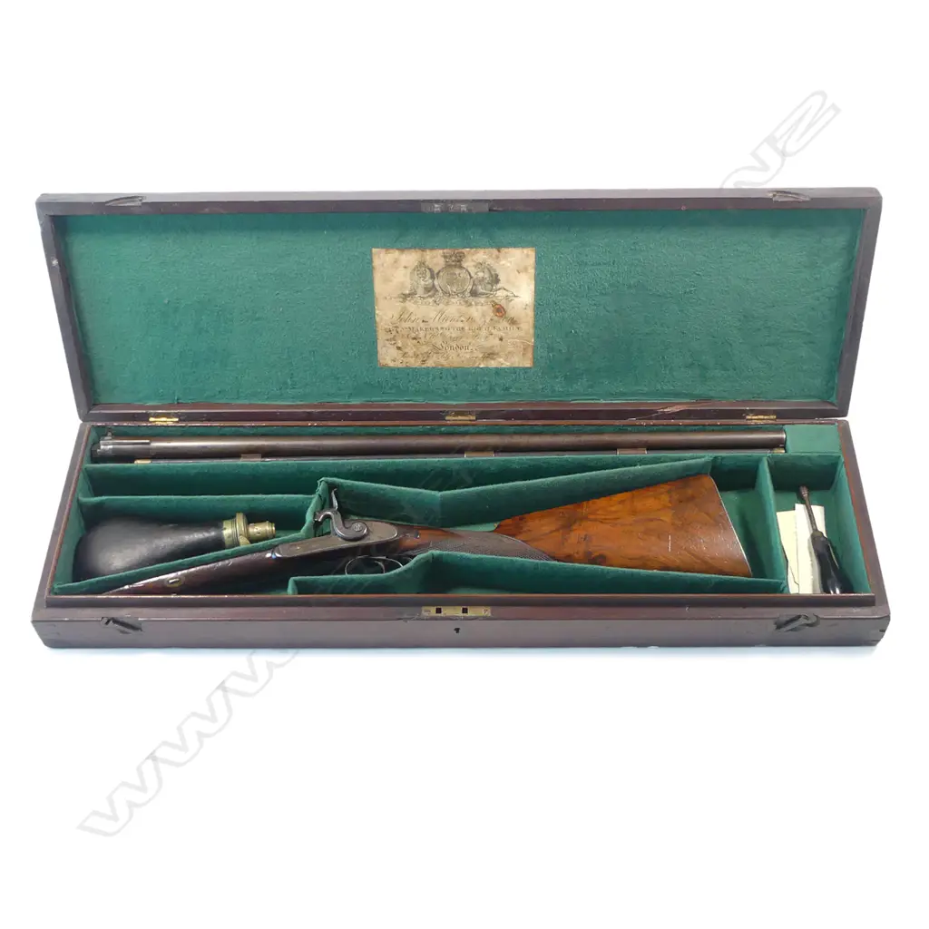 A fine early19thC .18 bore muzzle loading percussion double barrel sporting gun, by John Manton & Son, London, in baize lined fitted mahogany case. Image 1++
