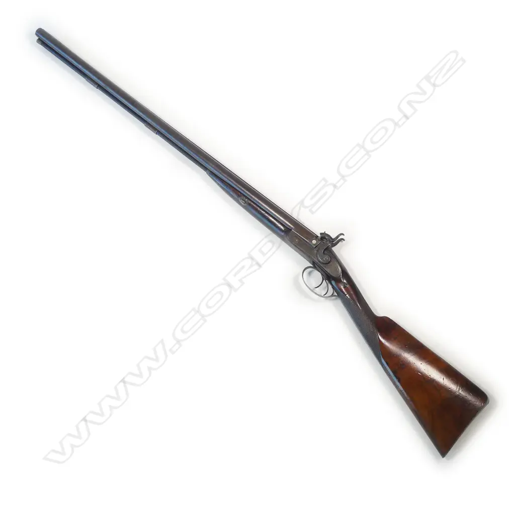 A fine early19thC .18 bore muzzle loading percussion double barrel sporting gun, by John Manton & Son, London, in baize lined fitted mahogany case. Image 1++