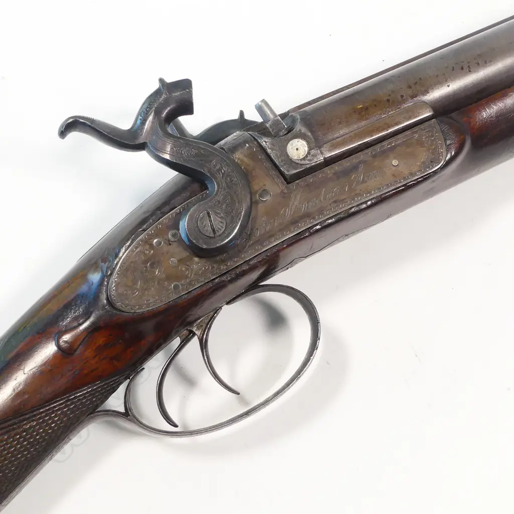 A fine early19thC .18 bore muzzle loading percussion double barrel sporting gun, by John Manton & Son, London, in baize lined fitted mahogany case. Image 1++