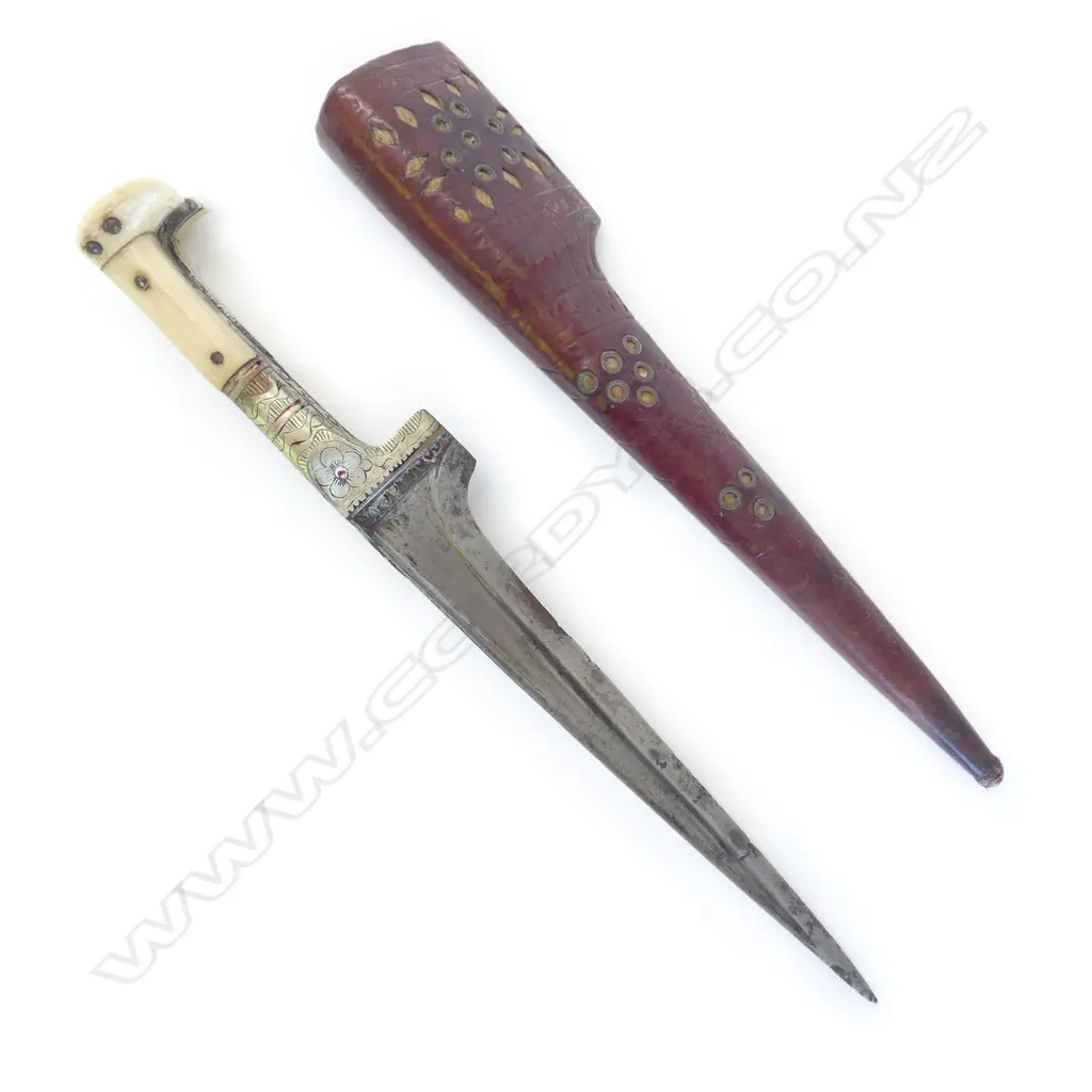 A Persian pesh kabz dagger and scabbard, the  8” long T-backed blade with some rust areas, Image 1++