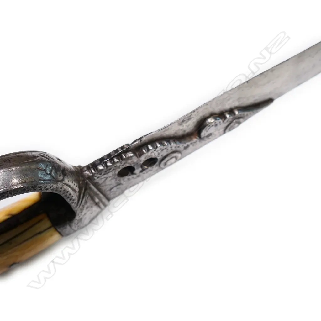 An 18thC Indo-Persian sword with ivory hooked grips, serpentine steel guard with quillon finial, Image 1++
