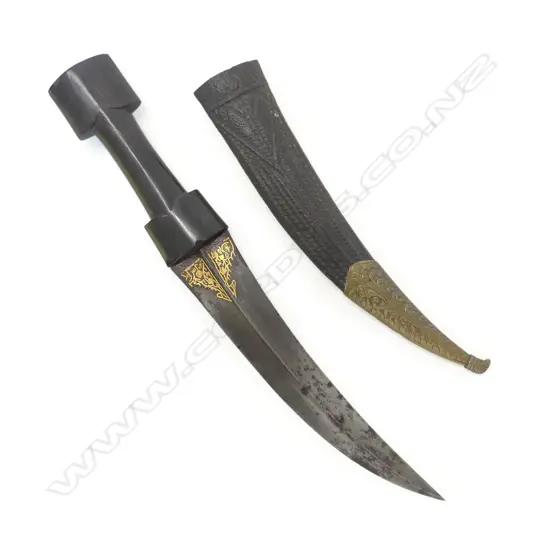 A North African jambaiya with horn handle and brass mounted leather scabbard,