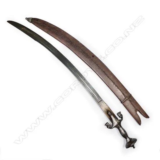 An Indian Palouar, with stout curved blade, single fuller and groove,