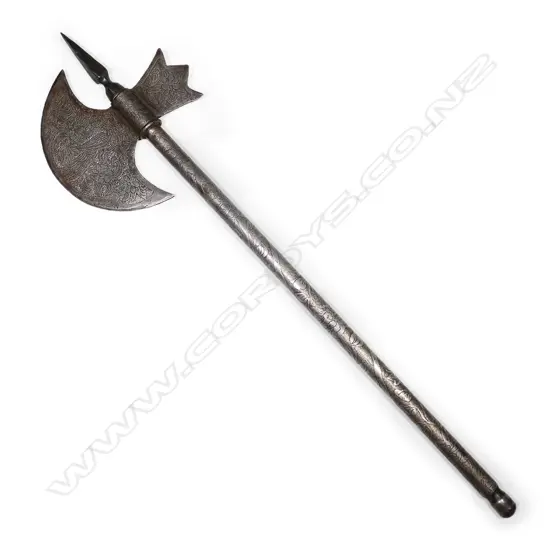 An Indo-Persian all-steel axe decorated all over with vines, flowers, and peacocks on blade,