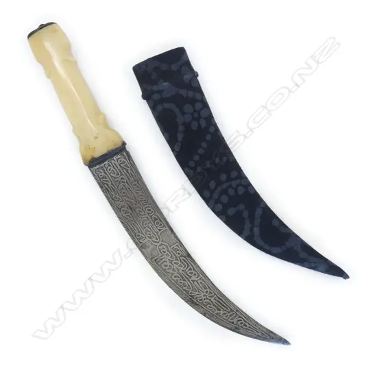 A Syrian bone handled curved steel bladed dagger,
