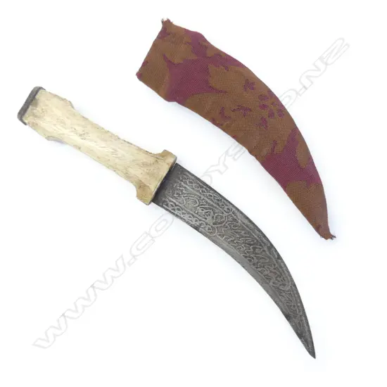 A small Syrian curved bladed dagger with bone hilt,