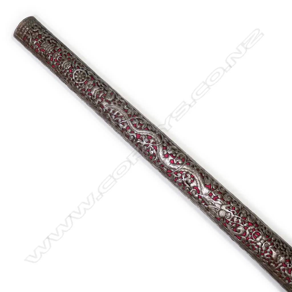 An 18/19thC Tibetan sword with ornately pierced steel scabbard and hilt, Image 1++