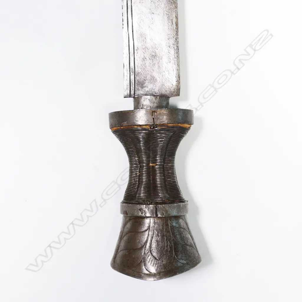 An 18/19thC Tibetan sword with ornately pierced steel scabbard and hilt, Image 1++