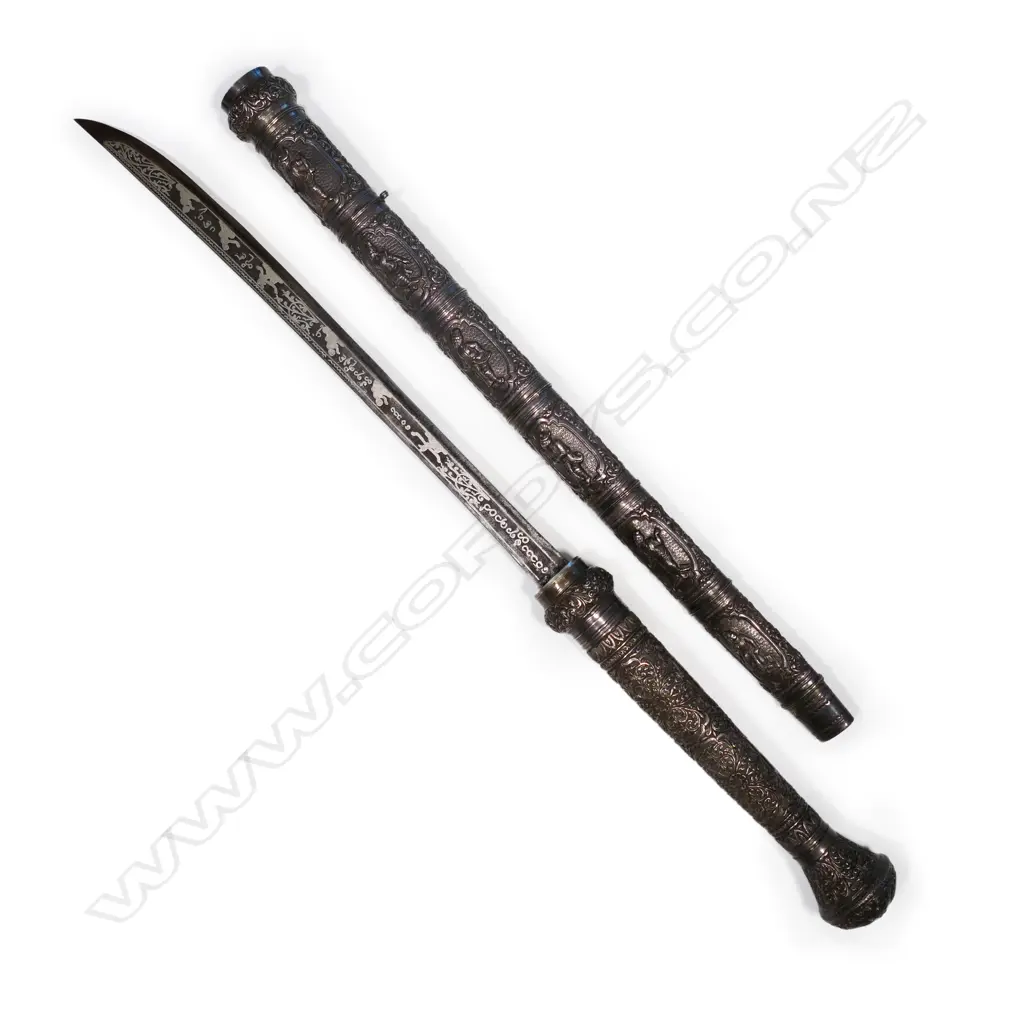 An ornate silver mounted Burmese (dha) sword, probably from the period of British rule (1824-1948), Image 1++