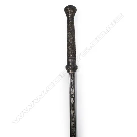 An ornate silver mounted Burmese (dha) sword, probably from the period of British rule (1824-1948),