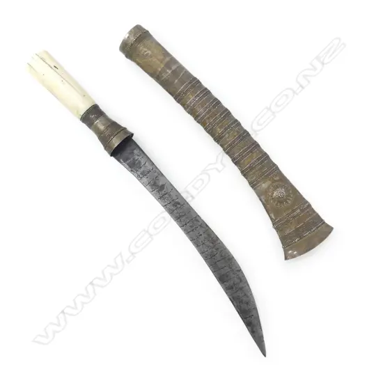 A 19thC Shan peoples, Eastern Burmese dagger (dha) with cylindrical ivory hilt,