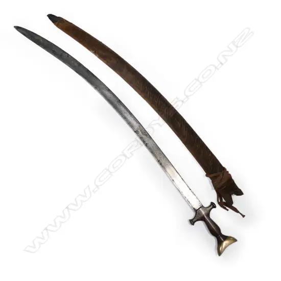 A Sumatran podong sword, with steel hilt with brass pommel,