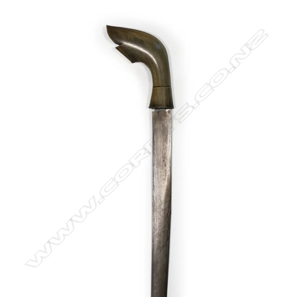 An Indonesian short sword with watered blade, Image 1++