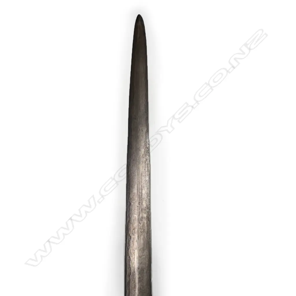 An Indonesian short sword with watered blade, Image 1++