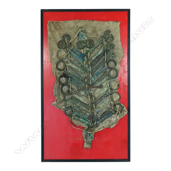 Archaic style, verdigris patinated bronze rings and bars reputedly Sung Dynasty (AD960-1126) horse armour, thong strung and mounted on a leather panel.