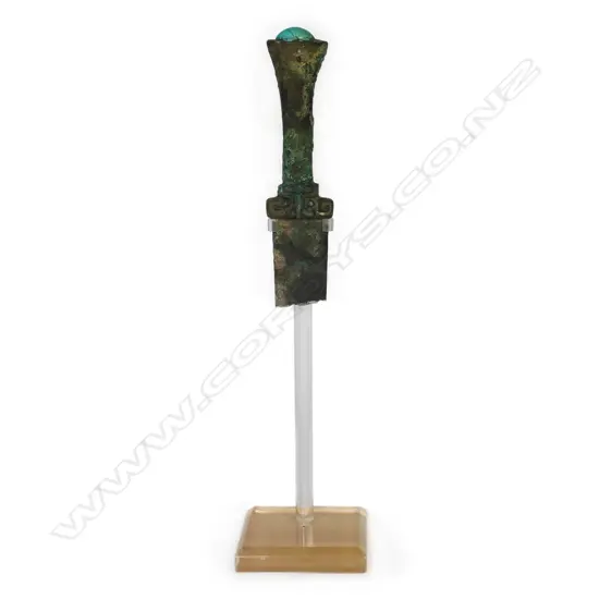 A Chinese Shang dynasty style bronzed dagger, with stand,